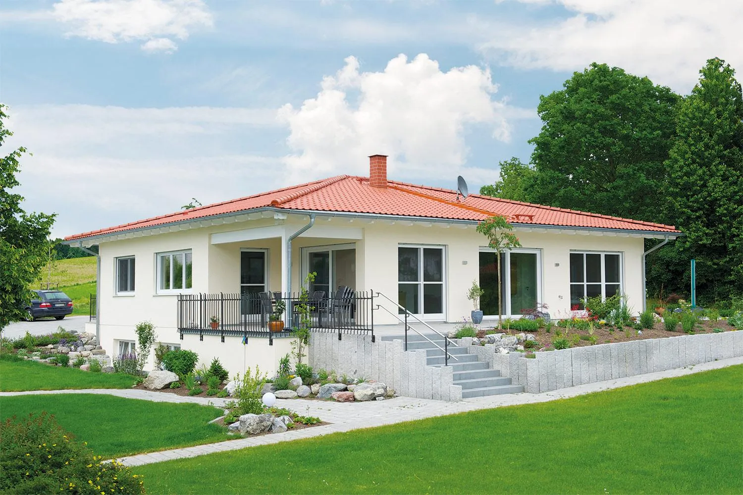 Bungalow mit Garten – WOLF-Haus Fertigbauweise